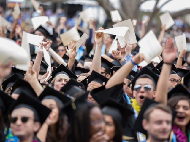 Happy crowd of grads at UCSB Commencement. Credit: Matt Perko