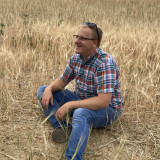 Joel in a wheat field